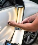 auto-hail-repair-pulling-dent